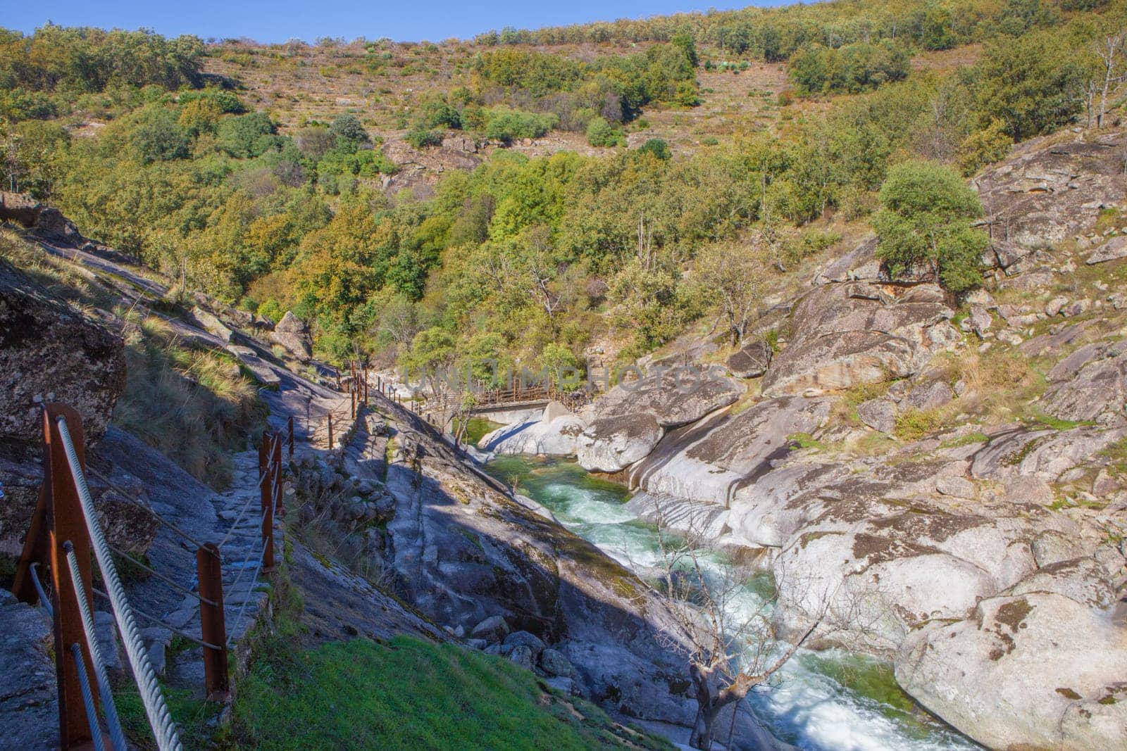 Garganta de los Infiernos Reserve. Los Pilones pedestrain bridge at bottom, Extremadura, Spain