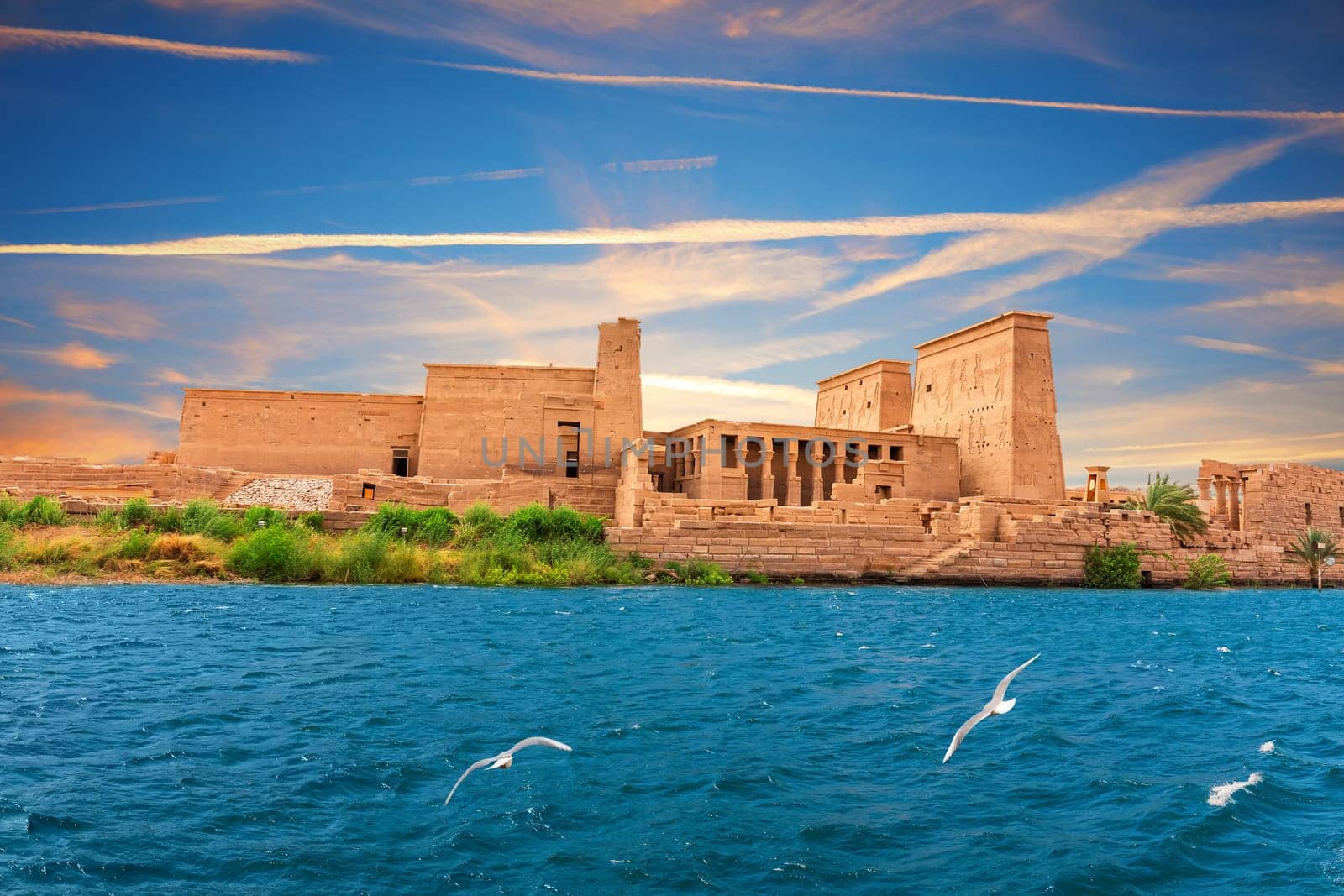 Philae Temple on Agilkia Island by the Nile, sunset view, Aswan, Egypt.