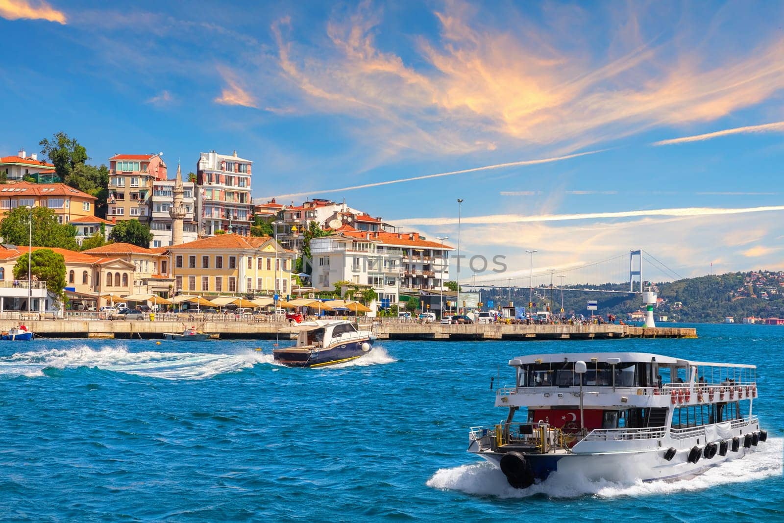 Ships are sailing near Bebek neighborhood on the bank of the Bosphorus Straight, Istanbul, Turkey.