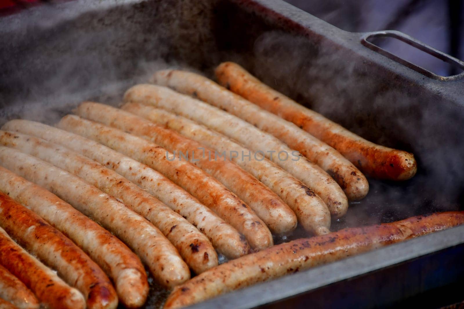 barbecue with Bratwurst on a German Christmas market