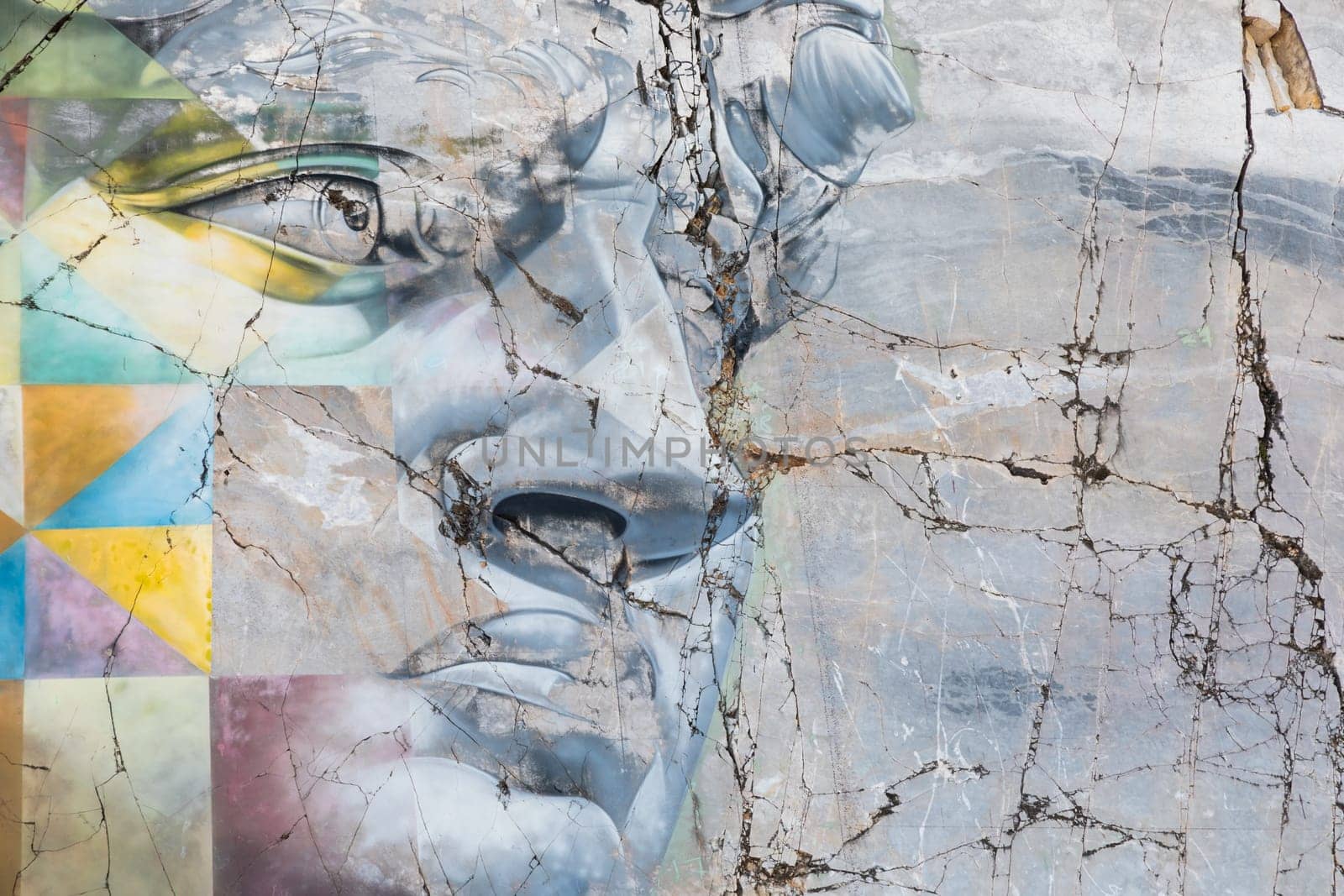 Colonnata, Italy - August 08 2024: famous David by Michelangelo copy from the street artist Kobra, the most beautiful murales in Italy