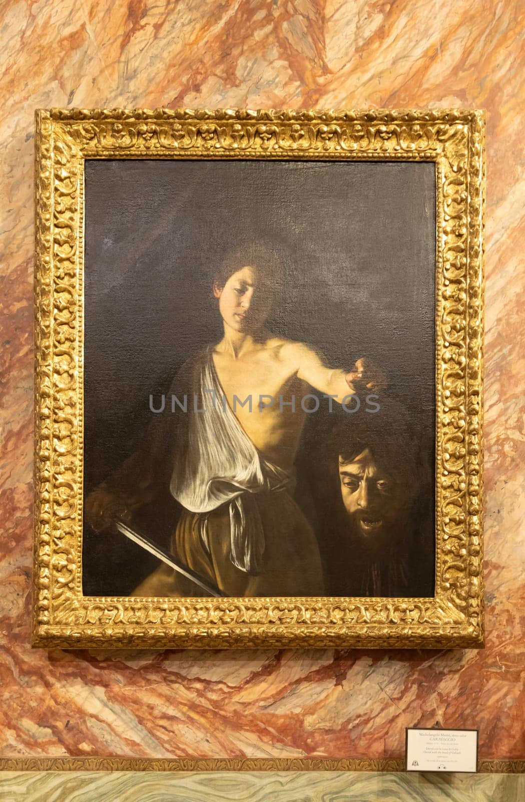 Rome, Italy - 28 December 2023: David with the head of Goliath, by Caravaggio, 1610 - oil on canvas - cm 125 x 101, Galleria Borghese