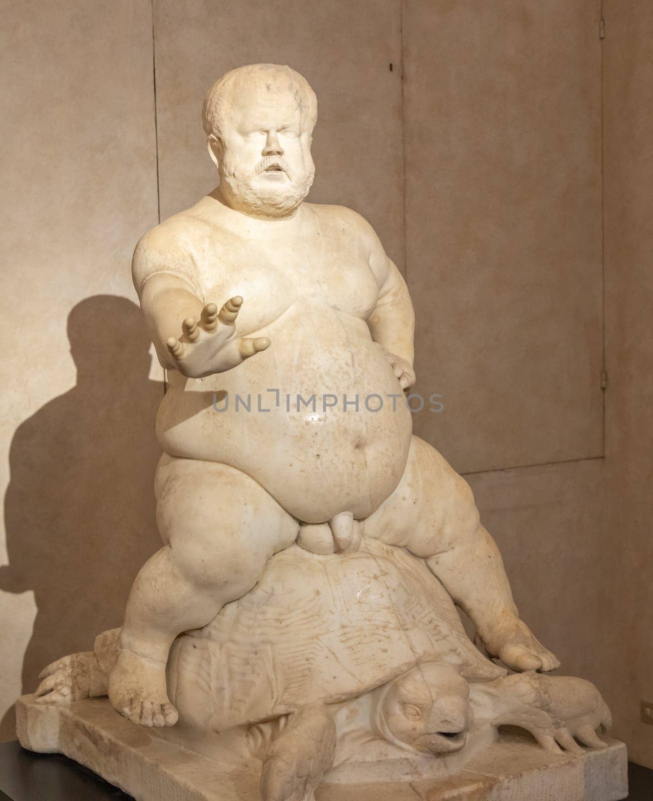 Florence, Italy - 28 December 2023: Morgante riding a tortoise, marble statue by Valerio Cioli, 1568. The dwarf Morgante belonged to the Medici family entourage. Original sculpture located in Boboli Gardens.