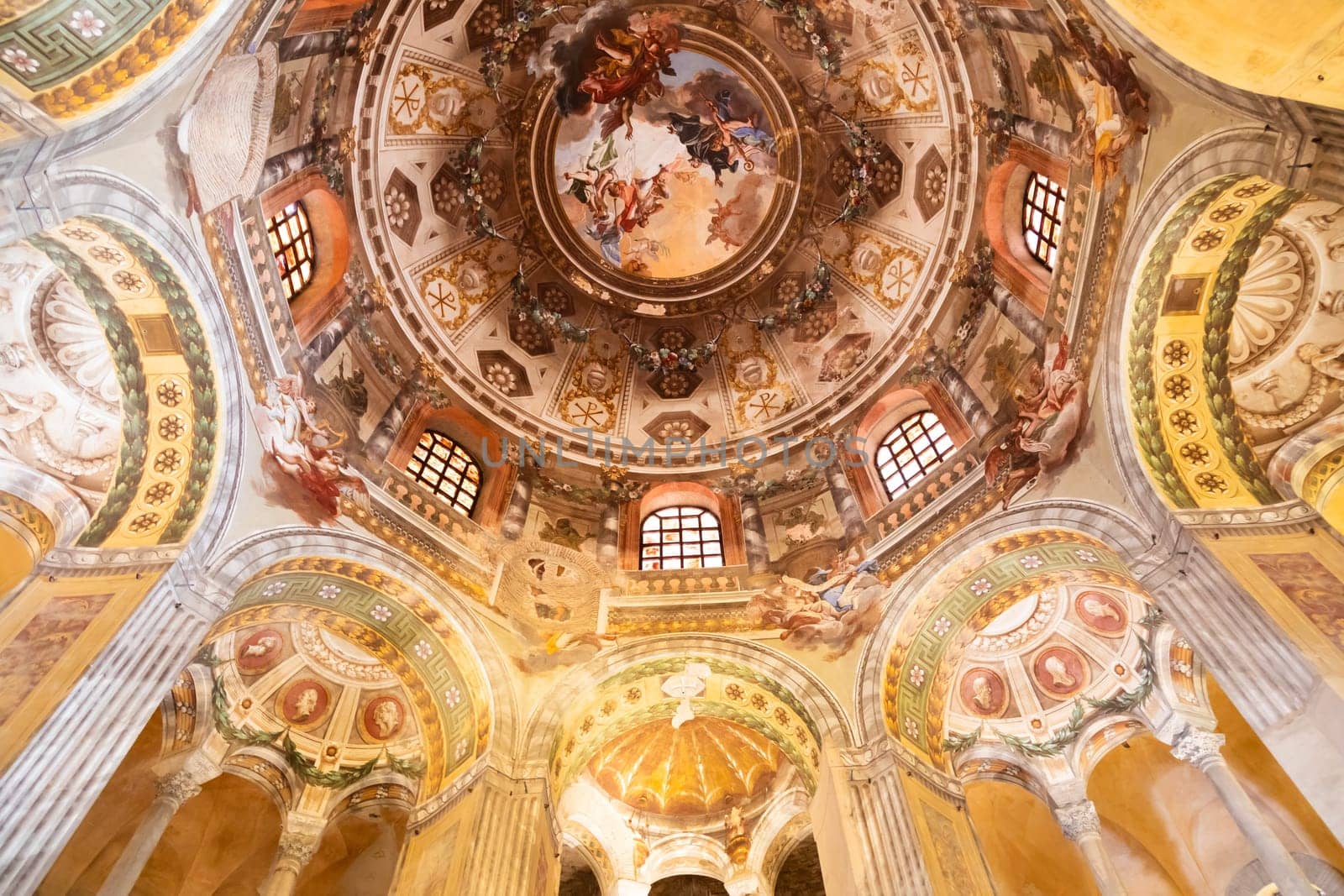 RAVENNA, ITALY - JUNE 12, 2024: San Vitale Basilica, ornate interior decor with mosaic, no people
