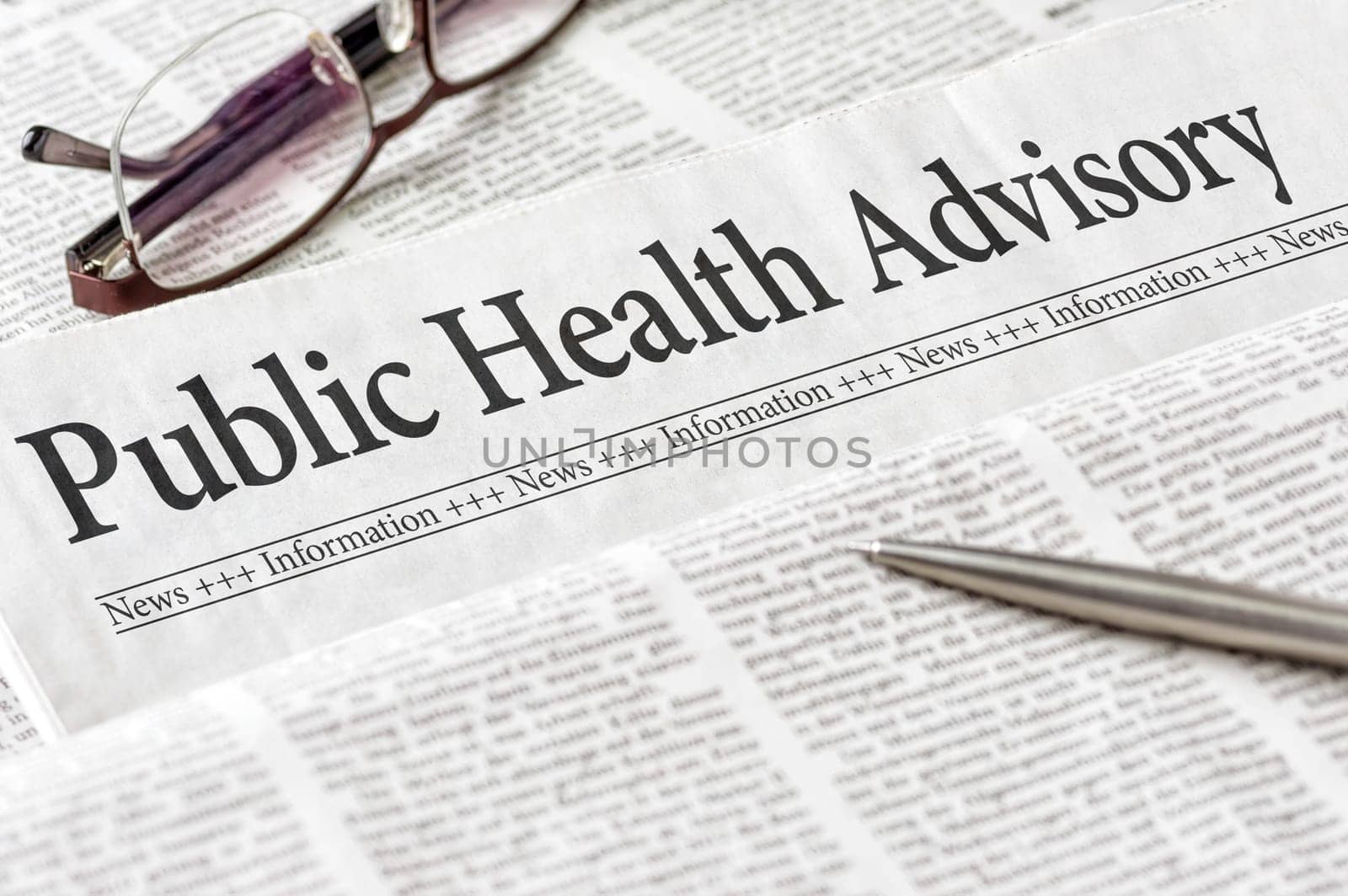 A newspaper with the headline Public Health Advisory