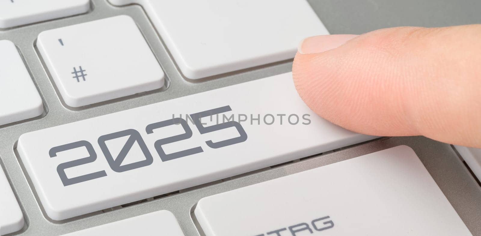 A keyboard with a labeled button - 2025