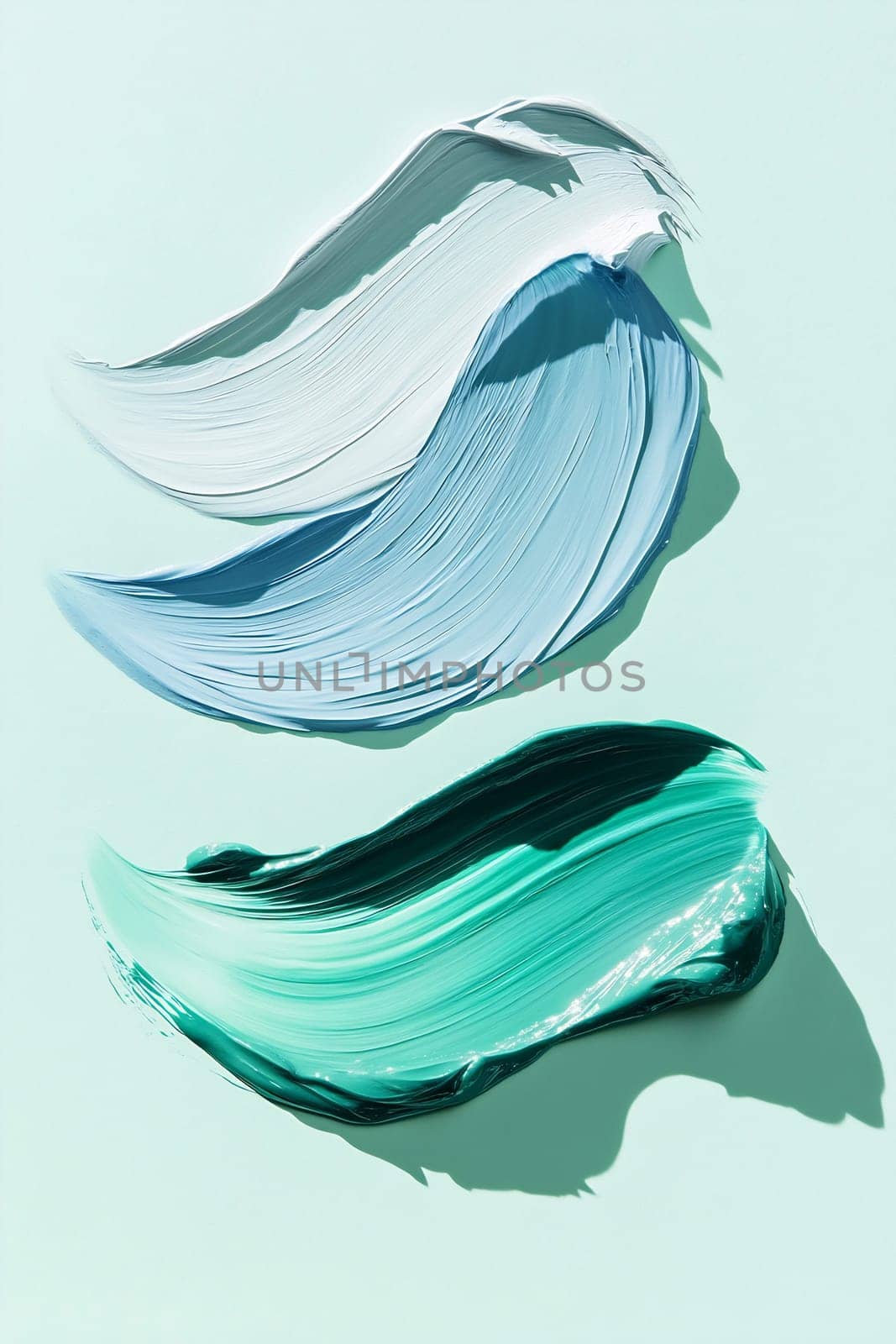 Three smooth brush strokes in pastel shades blend harmoniously against a light background, showcasing an artistic approach to color.
