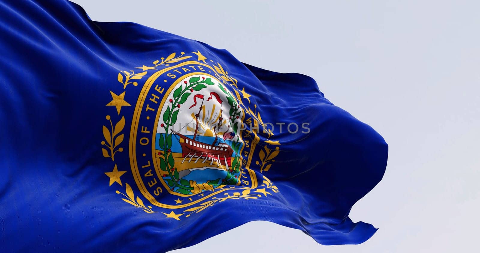 New Hampshire state flag waving in the wind on a clear day. Dark blue background with a state seal in the middle. 3d illustration render. Rippling fabric