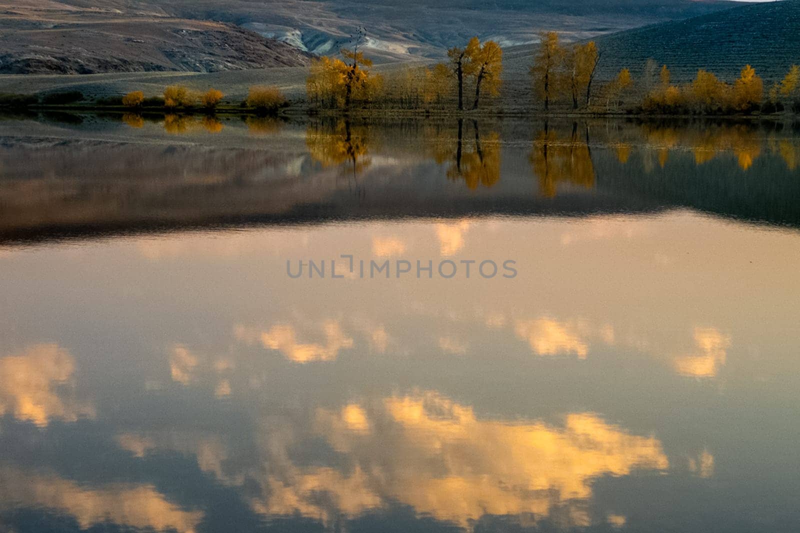 Mountain lake among the mountains on altai. The water surface of the lake.