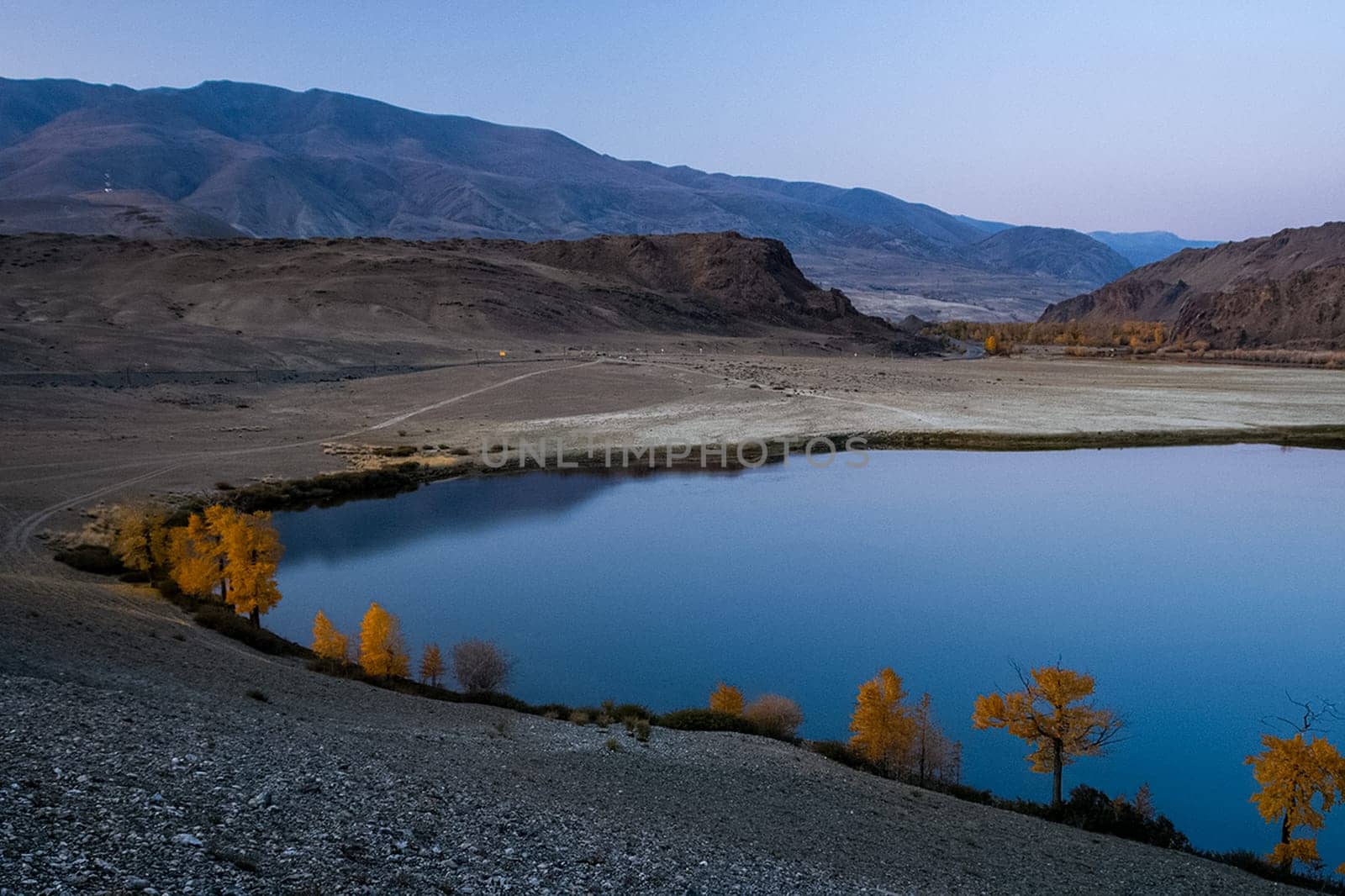 Mountain lake among the mountains on altai. The water surface of the lake.