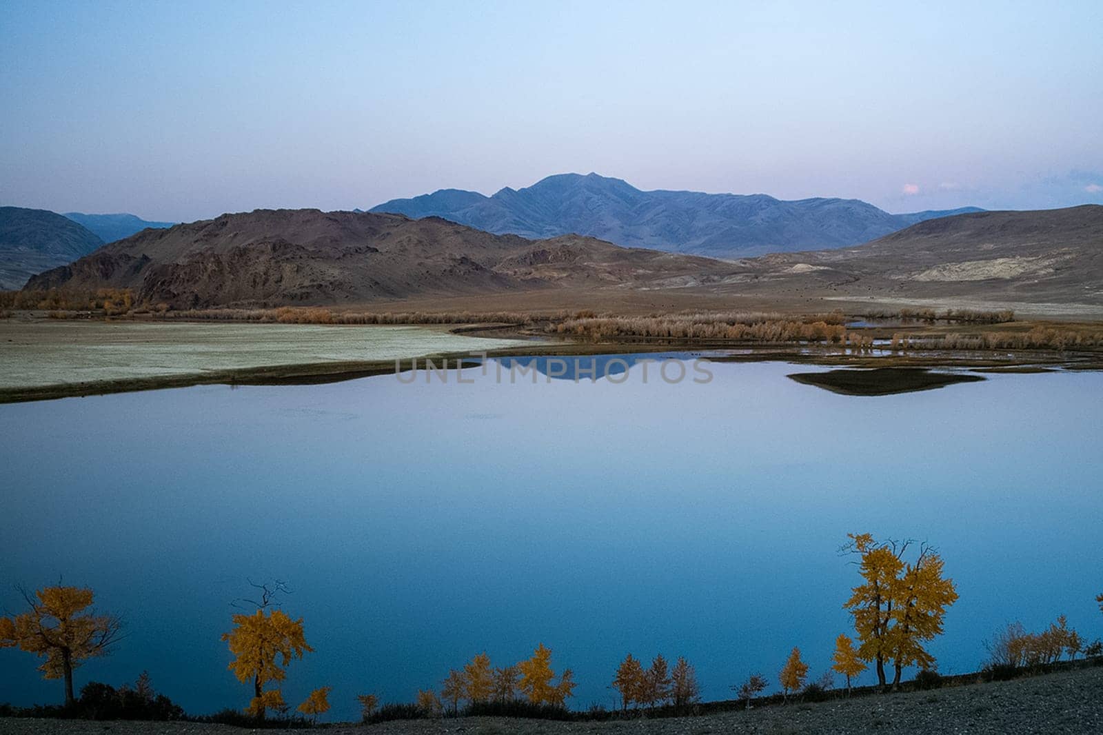 Mountain lake among the mountains on altai. The water surface of the lake.