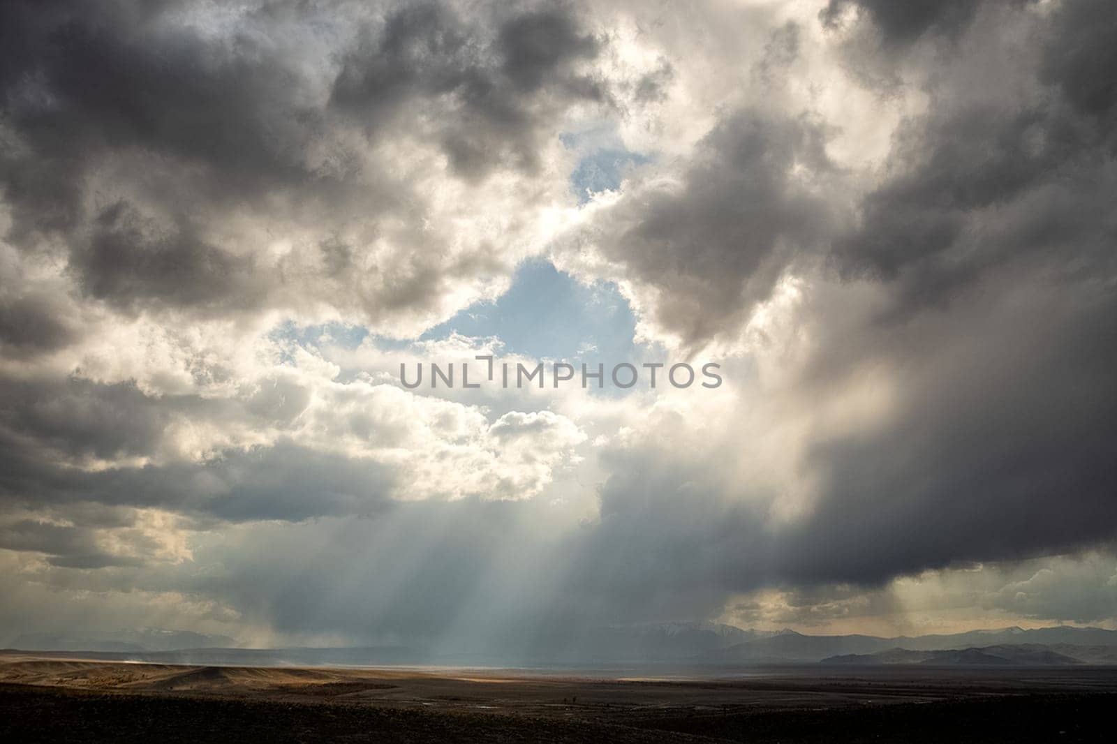 The sky is in the clouds above the altai mountains.