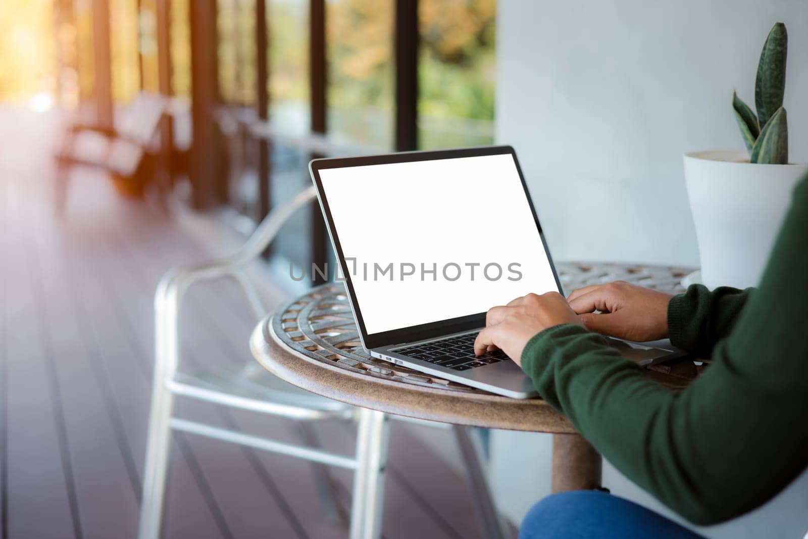 Woman use laptop and looking at it, Blank screen tablet with white background for advertising text, Woman using laptop contact business search information, Marketing and creative design.