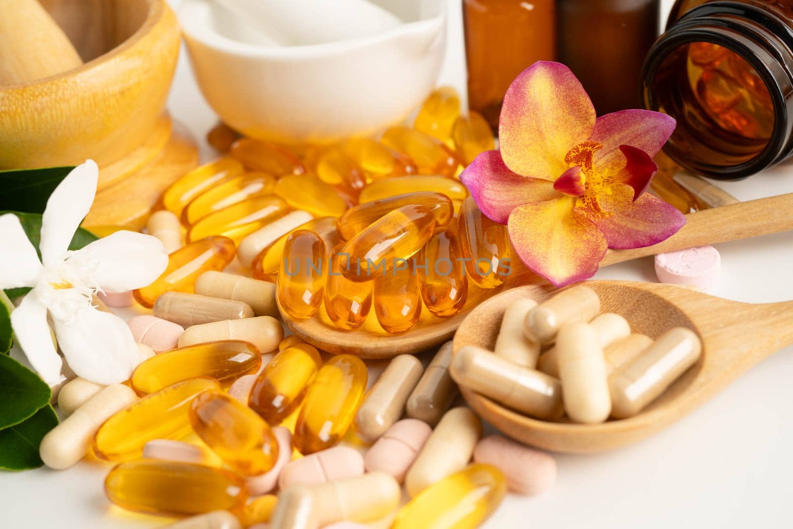 Alternative medicine herbal organic capsule with vitamin E omega 3 fish oil, mineral, drug with herbs leaf natural supplements for healthy good life.