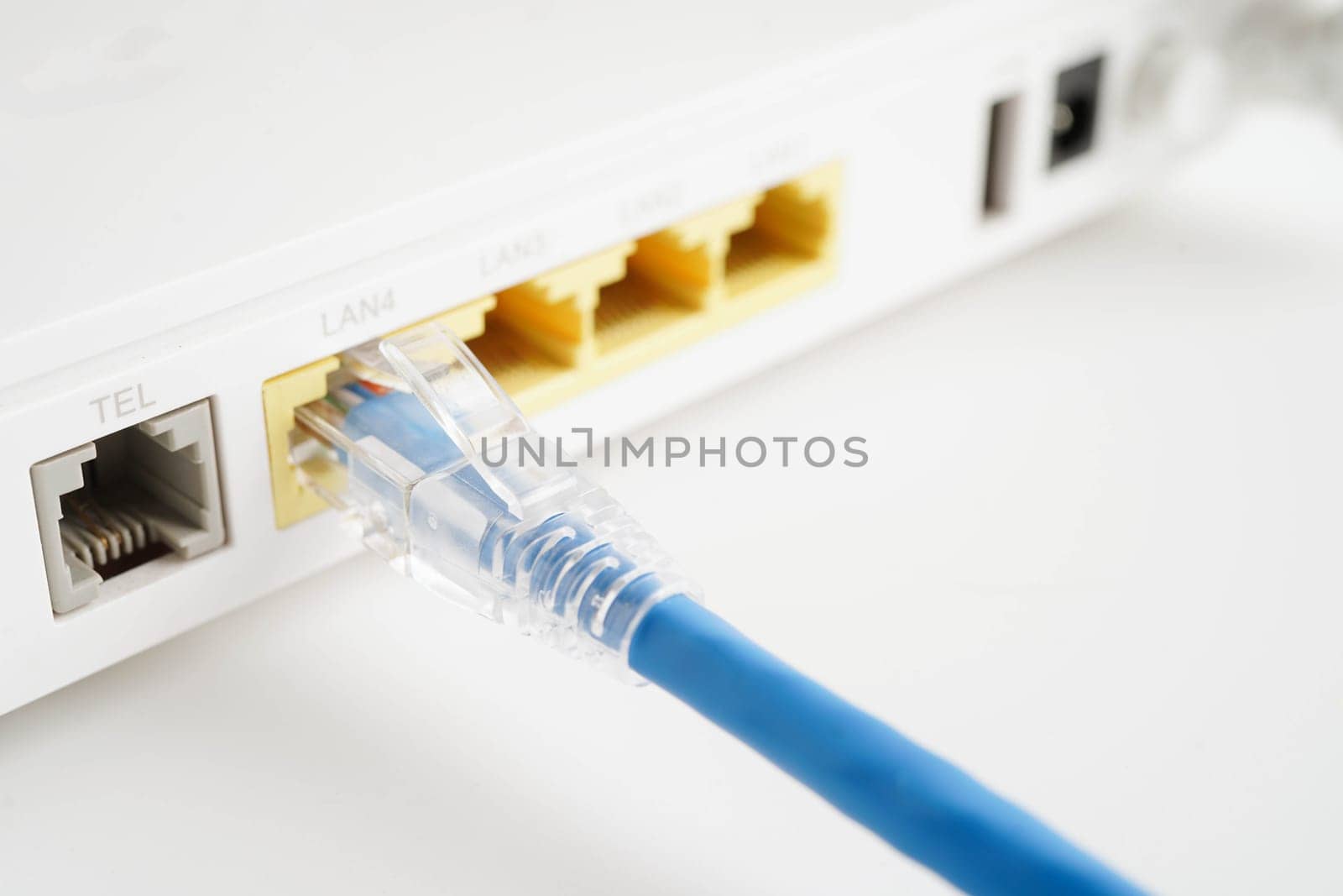 Ethernet cable with wireless router connect to internet service provider network.
