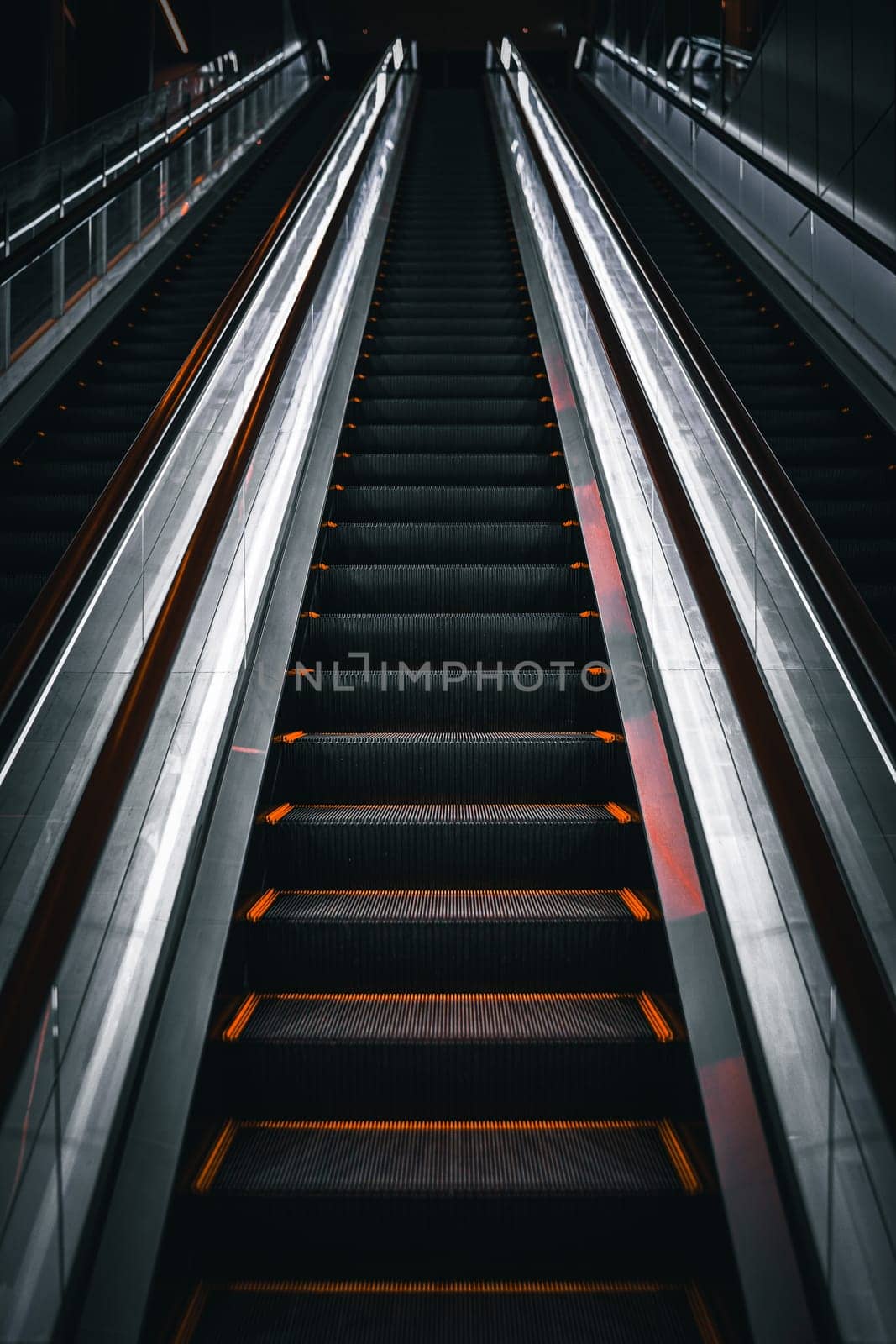 image of a black escalator. Shooting Location: Shibuya Ward, Tokyo