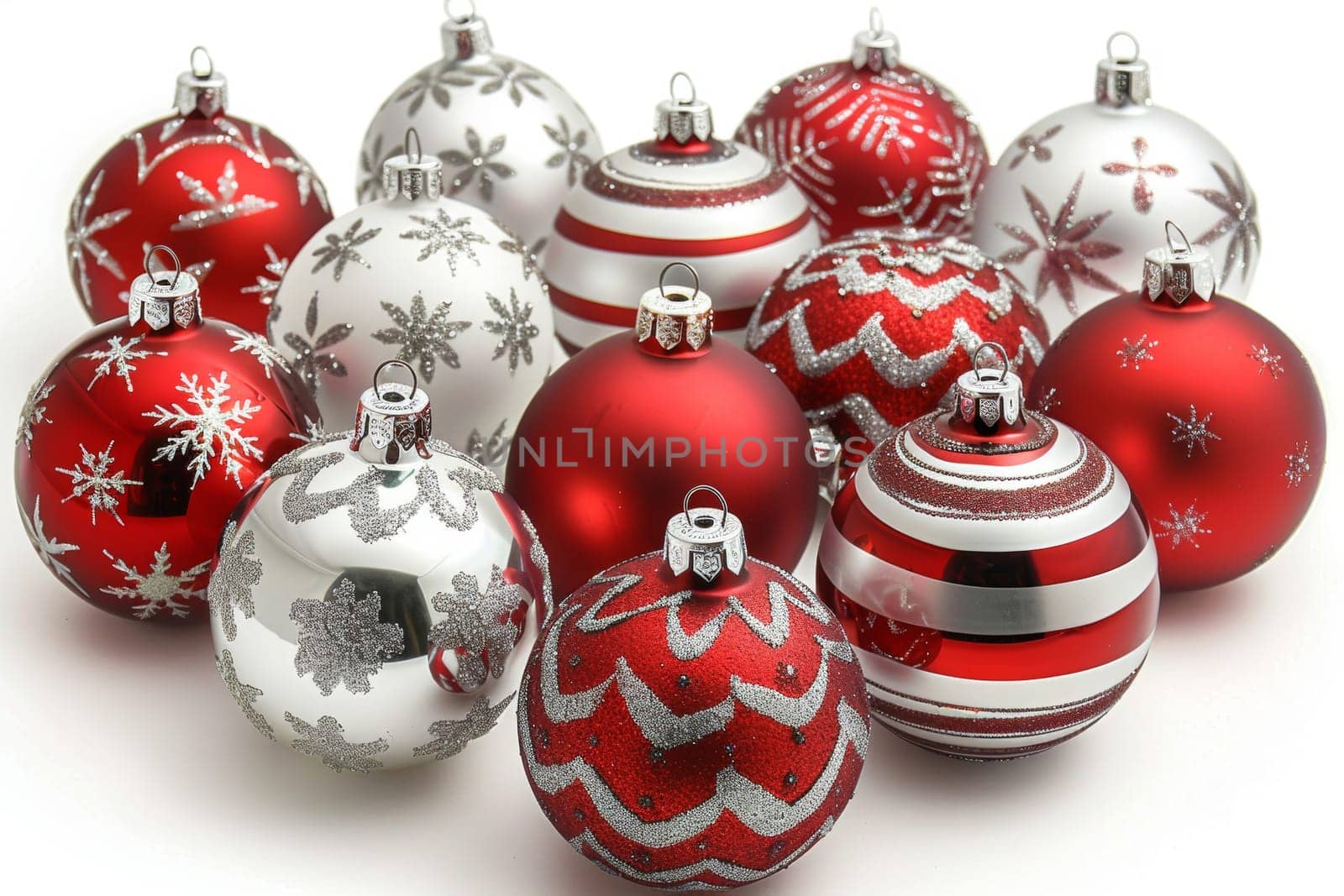 A collection of vibrant red and silver Christmas ornaments is beautifully arranged together, showcasing intricate designs and patterns. These festive decorations create a joyful holiday atmosphere.