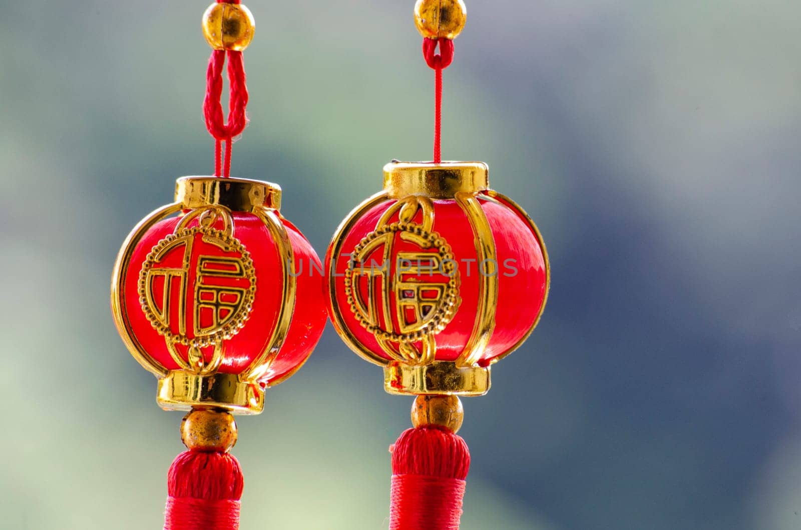 Close up view of two Chinese New Year hanging balls. Chinese New Year celebration concept.