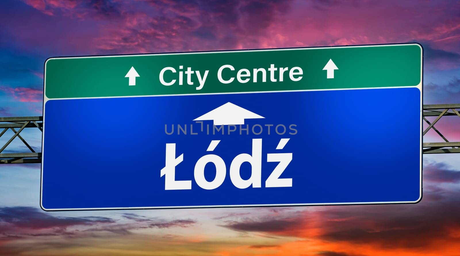 Road sign indicating direction to the city of Lodz, Poland.