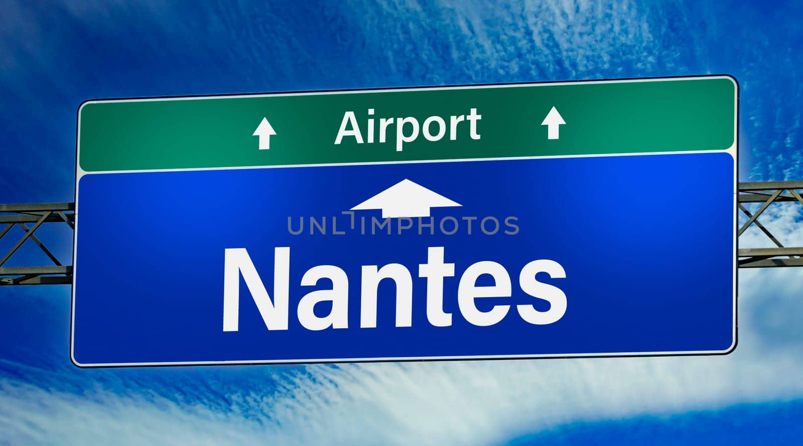 Road sign indicating direction to the city of Nantes, France.