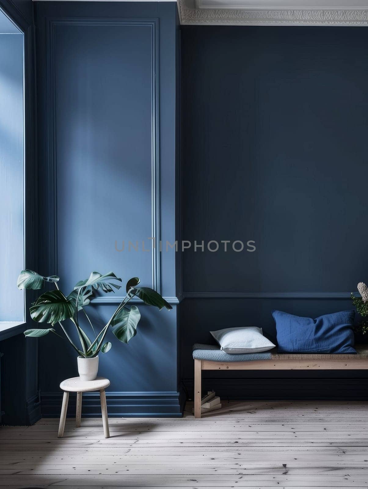 Classic blue panels and a simple bench create a timeless and elegant corner in this room