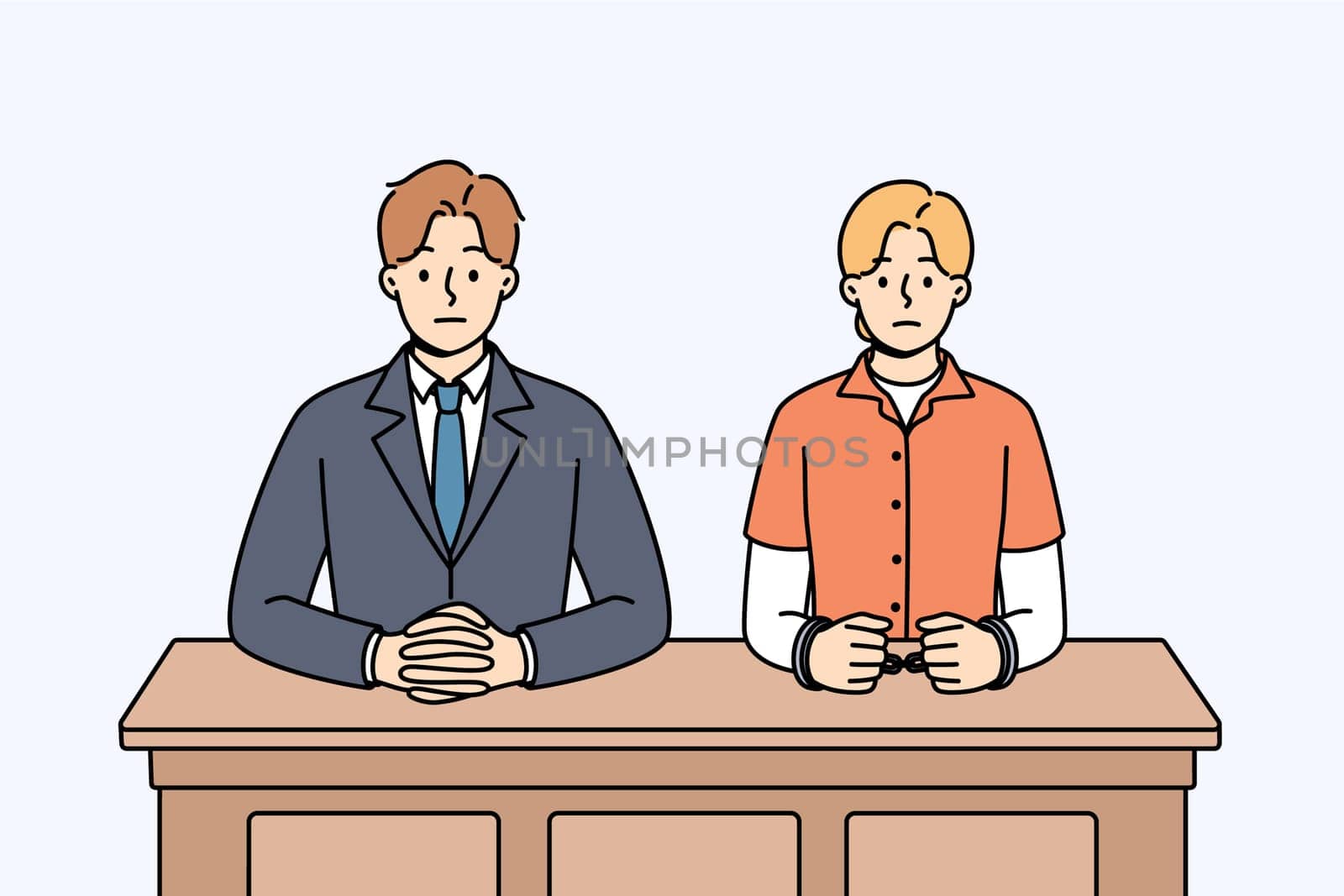 Man lawyer and woman defendant in handcuffs sit at table awaiting verdict from judge. Lawyer defends interests of girl accused of crimes and at risk of receiving prison sentence for breaking law.