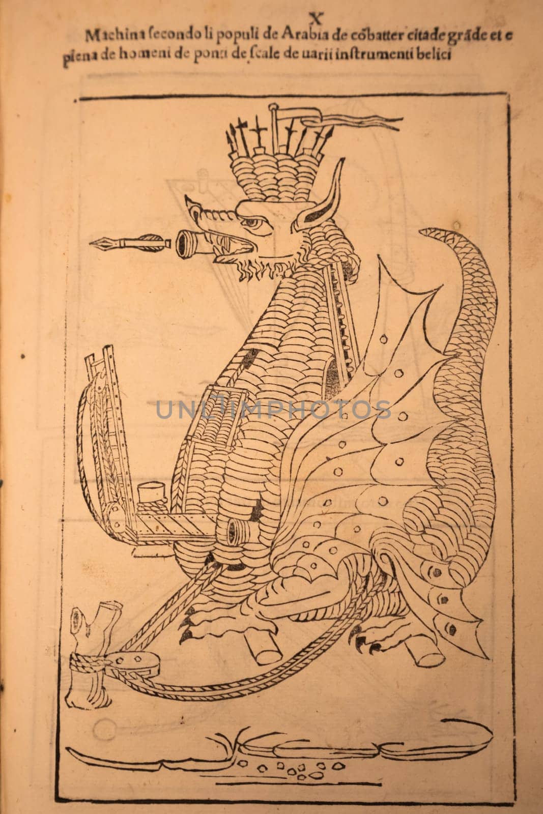 Turin, Italy - 30 April 2024. Ancient book De re militari by Roberto Valturio, 1483. Compendium of military theories from antiquity.