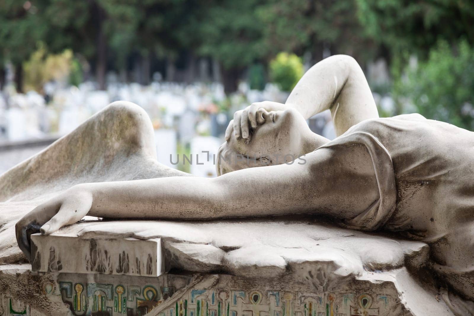 Genoa, Italy - 17 August 2024: desperate angel crying on Ribaudo family tomb, 1920