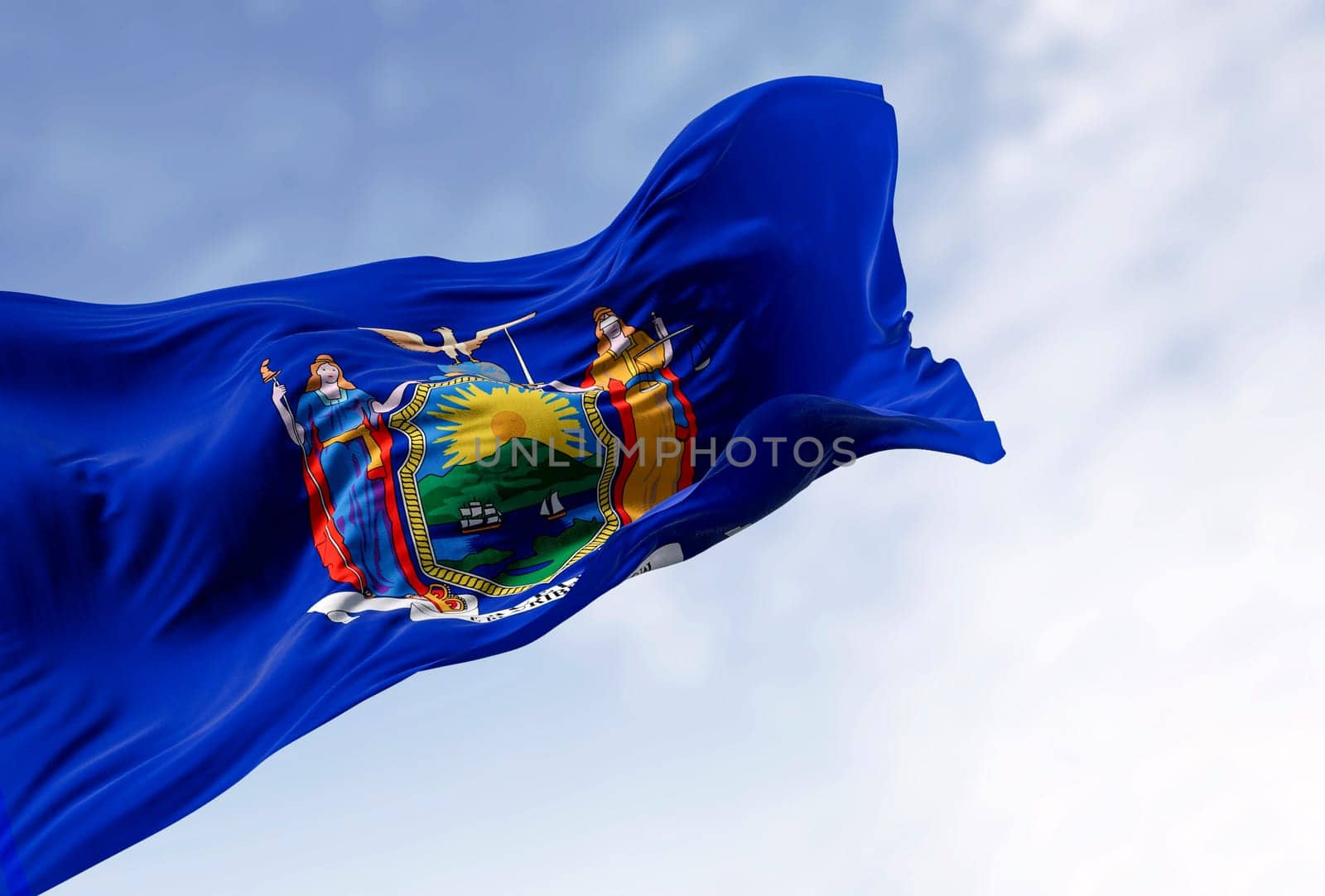 Close-up of New York State flag waving on a clear day. Blue background with state coat of arms. Fluttering textile. 3d illustration render. Selective focus