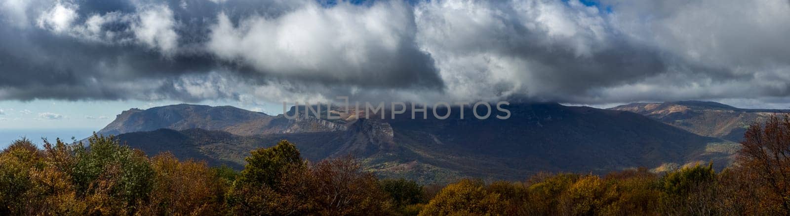 Beautiful cumulus clouds over the mountains and valleys of Crimea. The landscape of the nature of Crimea.
