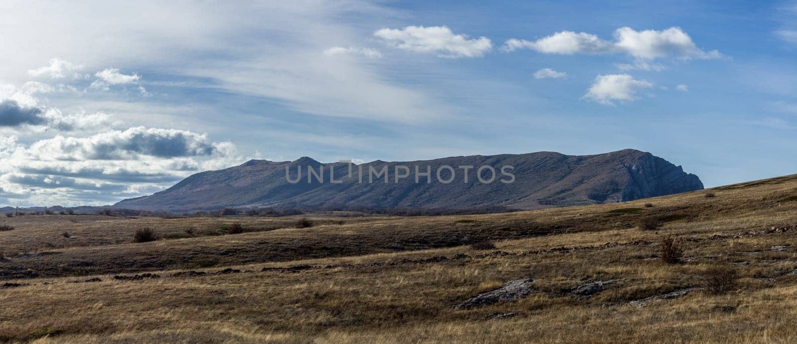 The nature of Crimea, mountains and sky. Grass and forests in the mountains.