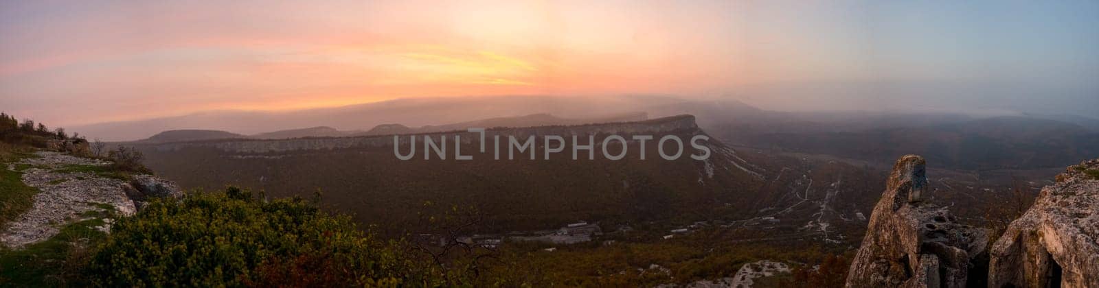 Sunset in the mountains of Crimea, Sunset landscape with rays of sun and mountains.
