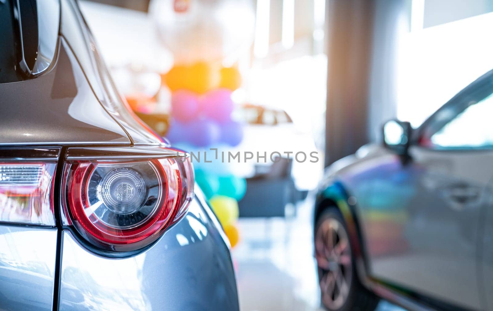 Car parked in luxury showroom. Car dealership office. Car showroom business. New car parked in modern showroom. Auto for sale and rent business. Automobile leasing and insurance. Electric automobile.