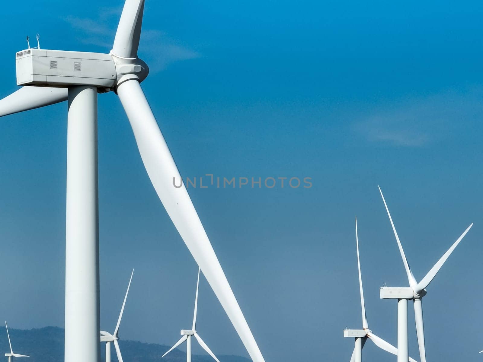 Wind energy and sustainable power generation with wind turbines, Eco-friendly solutions for renewable resources. Wind power farm and sustainable development of renewable energy, green technology.