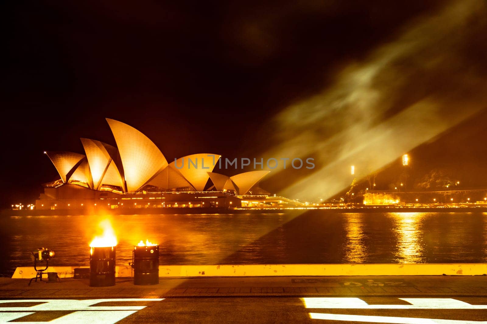 Warm night view of the opera house. Shooting Location: sydney, australia