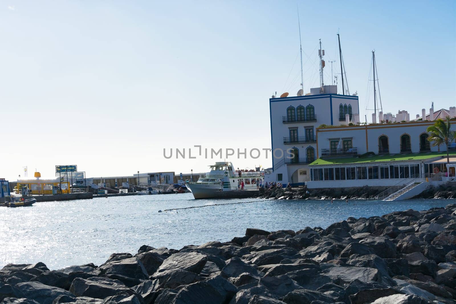 CRAN CANARIA, PUERTO DE MOGAN- NOVEMBER 15, 2019: Cran Canaria, Puerto de Mogan, Spain - November 15, 2019: View from the observation deck over the old town to Marina, Puerto de Mogan, Gran Canaria, Canary Islands, Spain