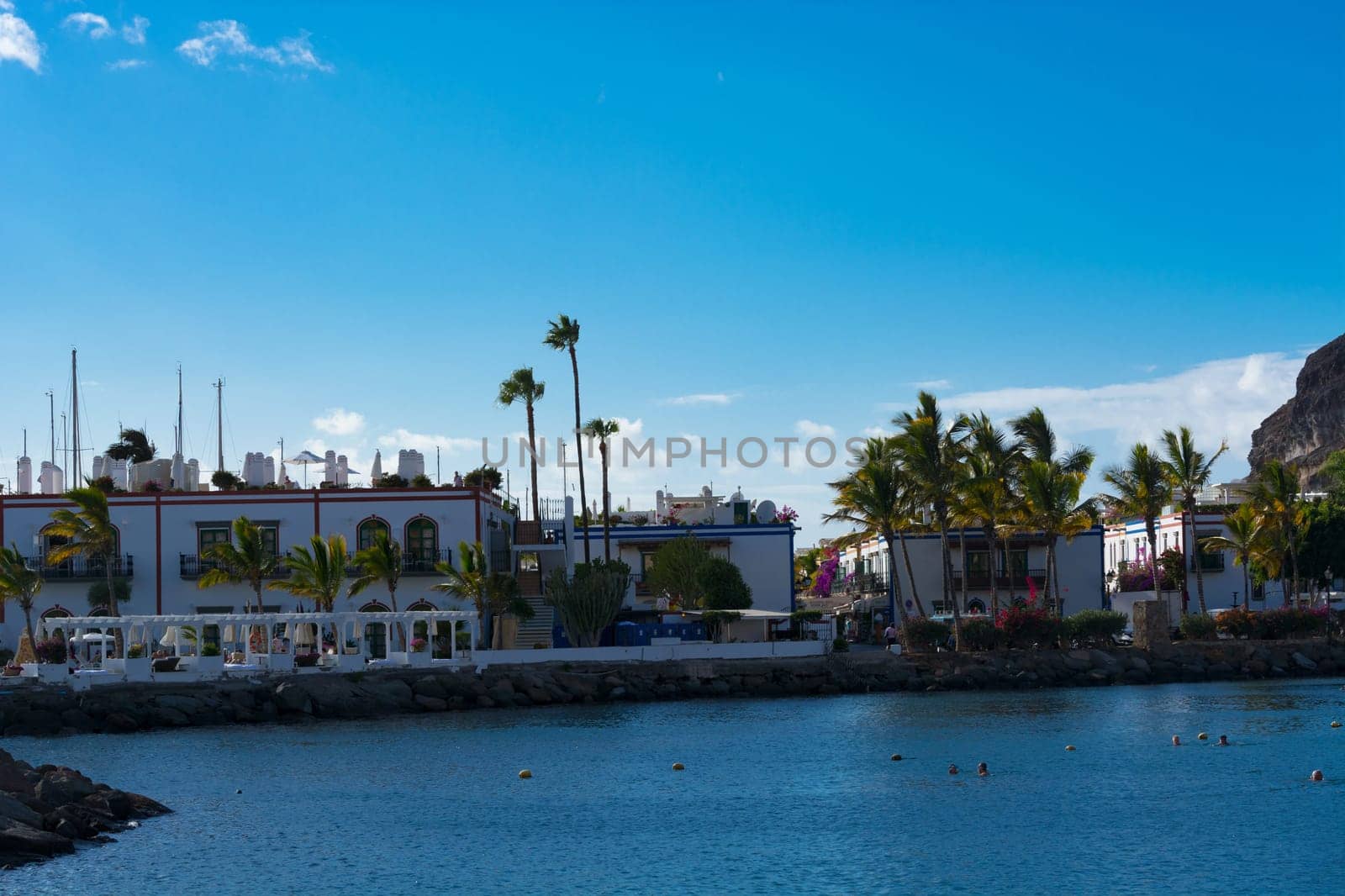 CRAN CANARIA, PUERTO DE MOGAN- NOVEMBER 15, 2019: Cran Canaria, Puerto de Mogan, Spain - November 15, 2019: View from the observation deck over the old town to Marina, Puerto de Mogan, Gran Canaria, Canary Islands, Spain