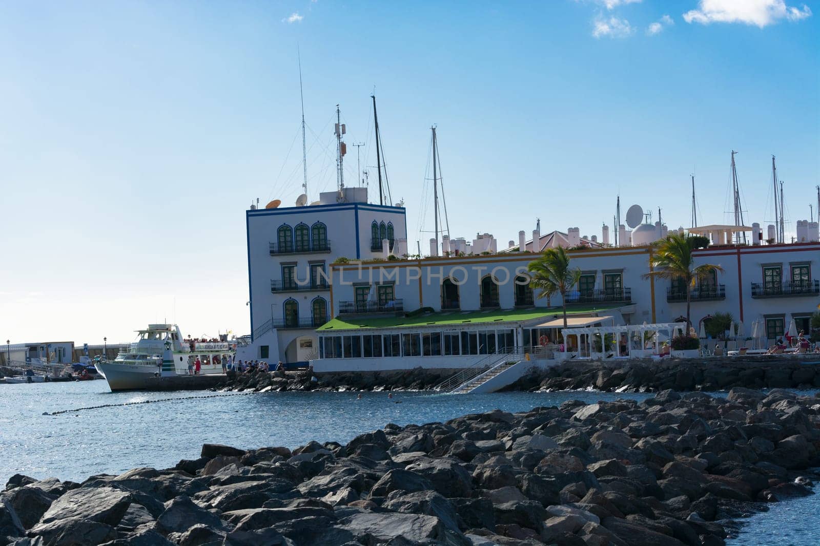 CRAN CANARIA, PUERTO DE MOGAN- NOVEMBER 15, 2019: Cran Canaria, Puerto de Mogan, Spain - November 15, 2019: View from the observation deck over the old town to Marina, Puerto de Mogan, Gran Canaria, Canary Islands, Spain
