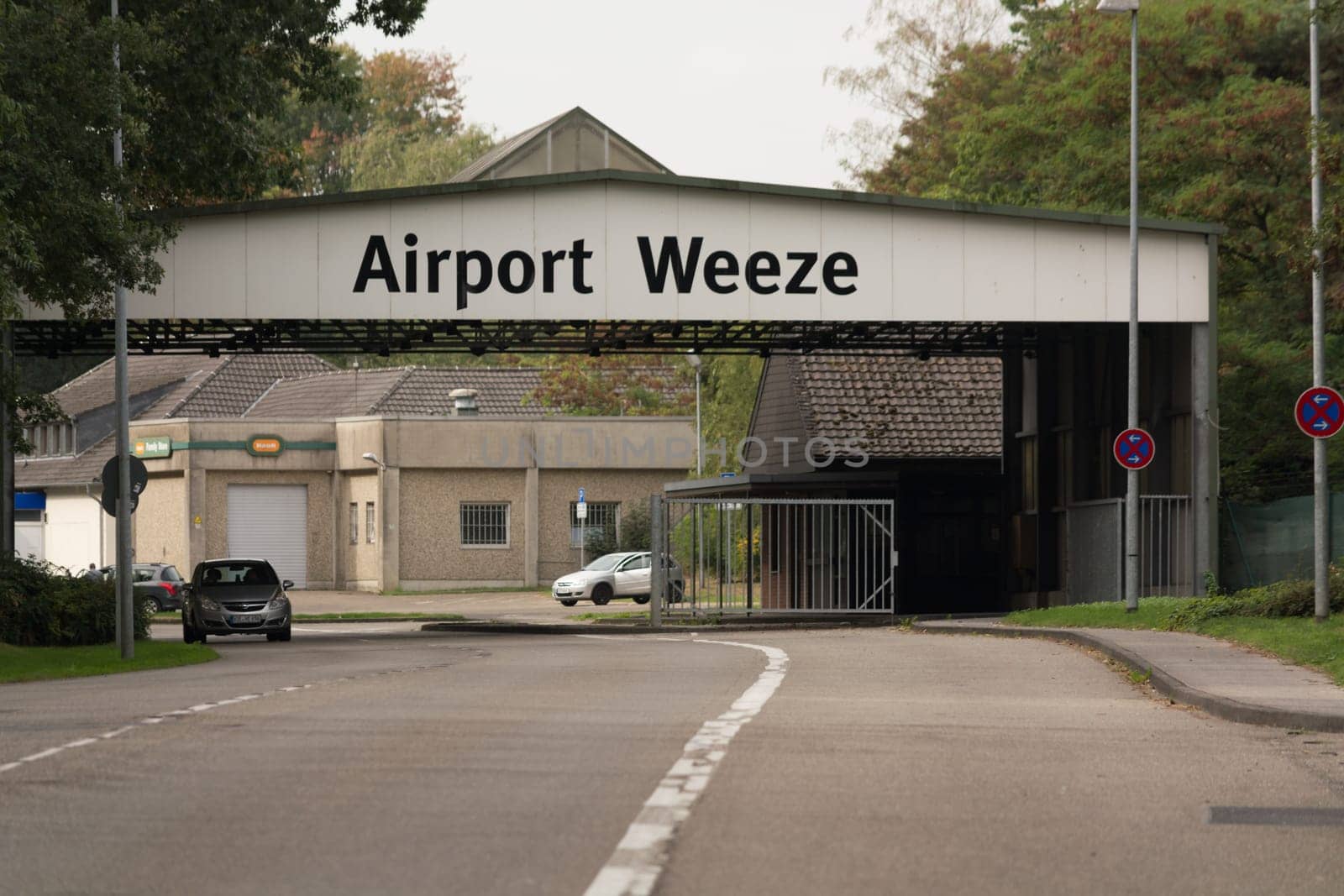 WEEZE, NRW, GERMANY - SEPTEMBER 10, 2018: Weeze, Nrw, Germany - September 10, 2018: Military outward access to Weeze Airport with old barracks buildings
