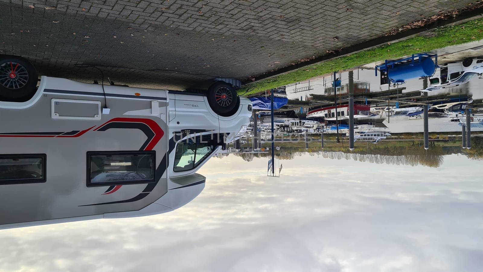 VENLO,  NETHERLANDS - NOVEMBER 07, 2021: Venlo, Netherlands - JNovember 07, 2021:  Motorhome in the small town port of Venlo in Holland, the Netherlands