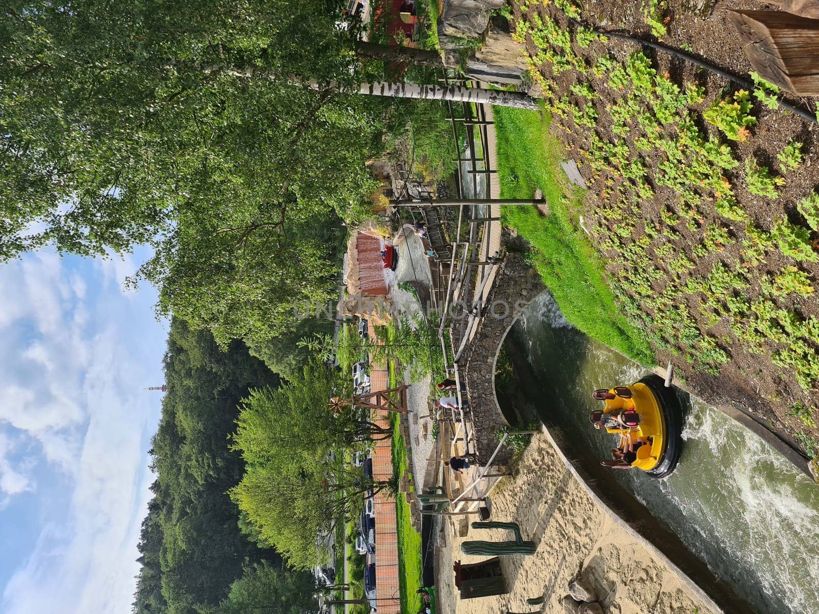 BESTWIG  NRW  GERMANY - JUNE 18  2020: Bestwig  Nrw  Germany - June 18  2020: Exciting ride on the raging river of a wild water ride