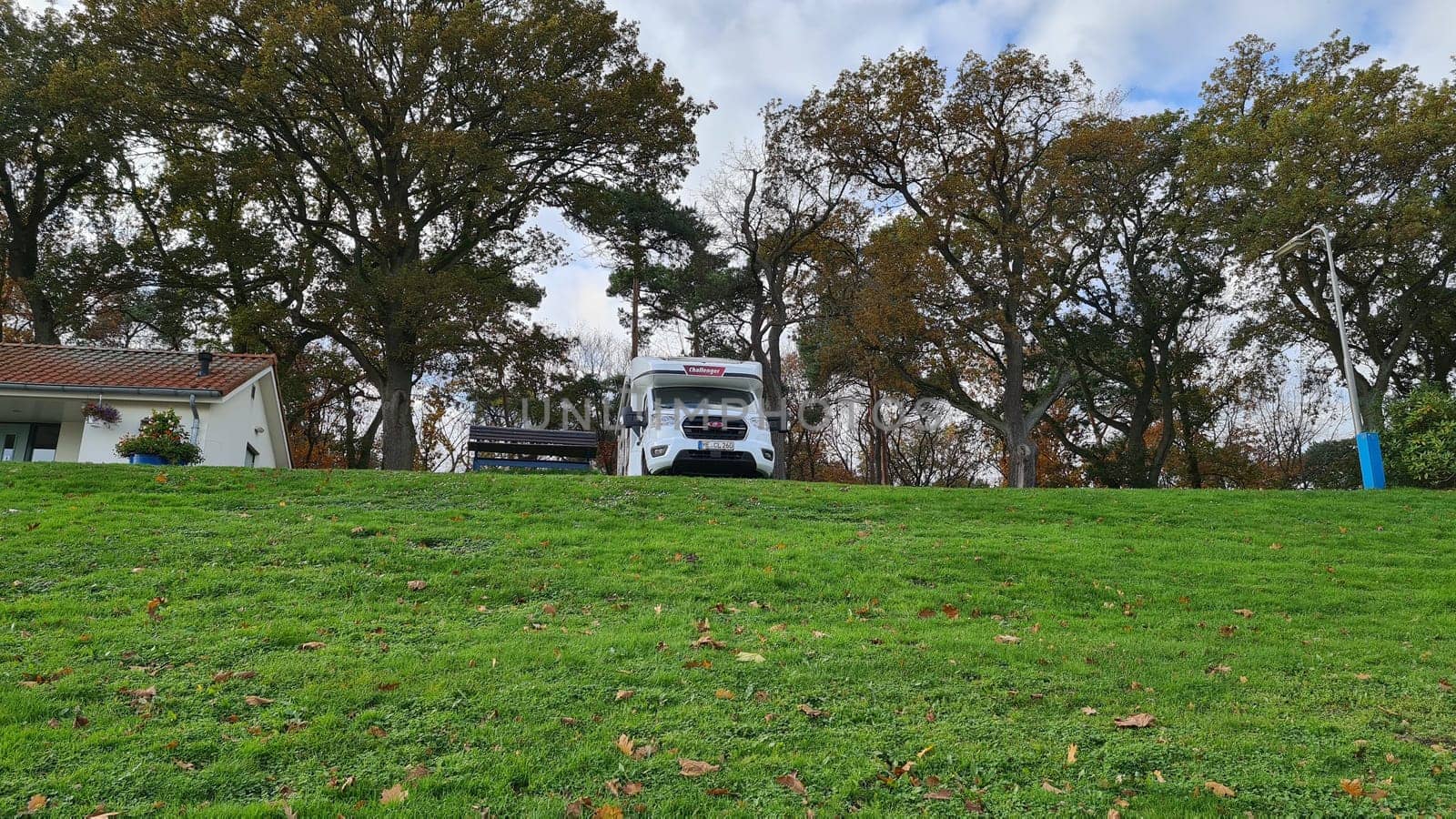 VENLO,  NETHERLANDS - NOVEMBER 07, 2021: Venlo, Netherlands - JNovember 07, 2021:  Motorhome in the small town port of Venlo in Holland, the Netherlands