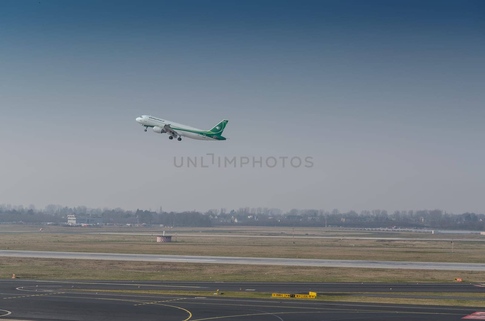 DUSSELDORF, NRW, GERMANY - MARCH 18, 2015:  Airbus A321 of Irak Airlines at startup on the Dusseldorf airport.