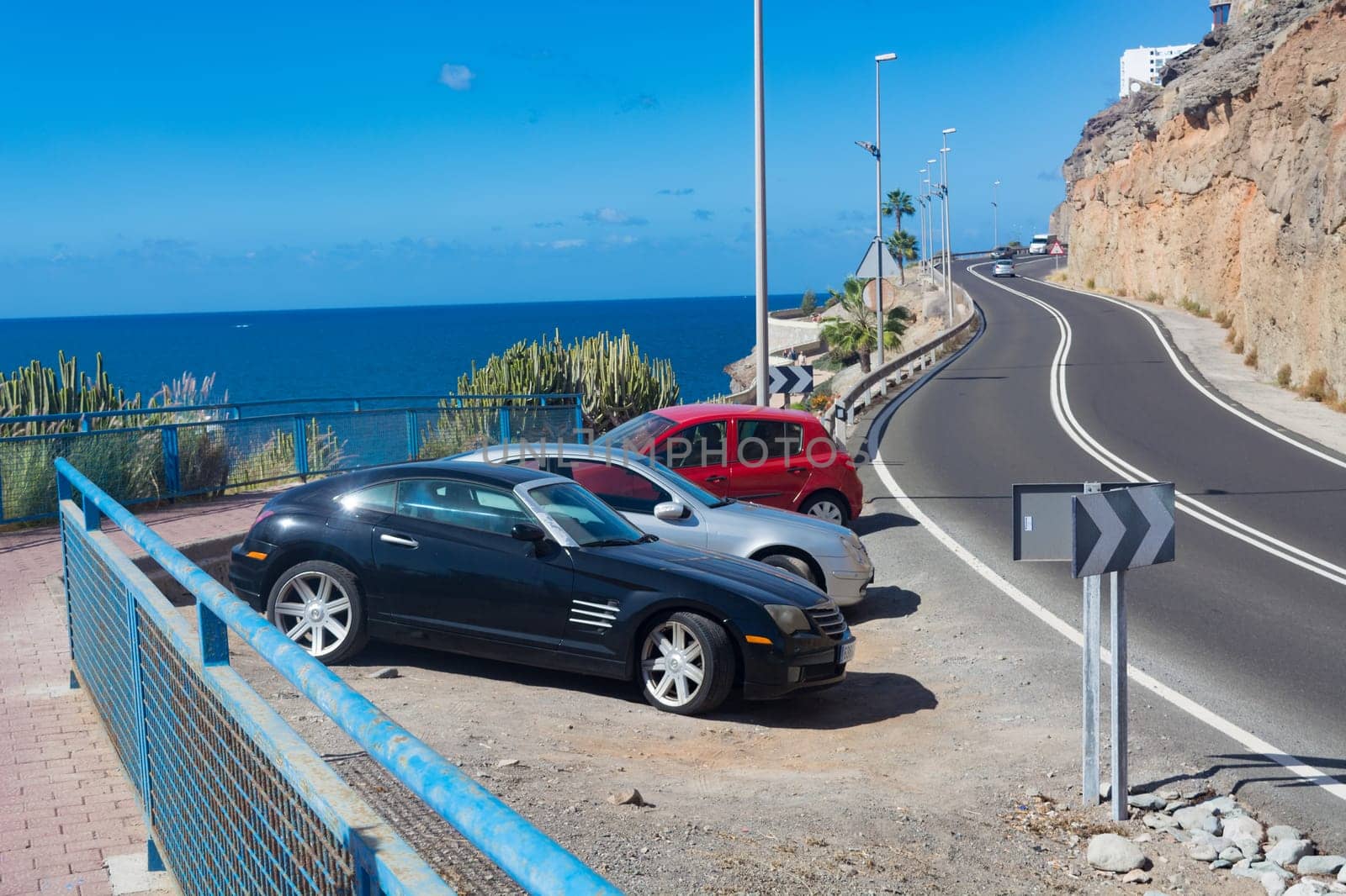 CRAN CANARIA, PUERTO RICO - NOVEMBER 16, 2019: Cran Canaria, Puerto Rico, Spain - November 16, 2019: Chrysler Crossfire Coupe in a parking lot above the marina in Puerto Rico on Gran Canaria.