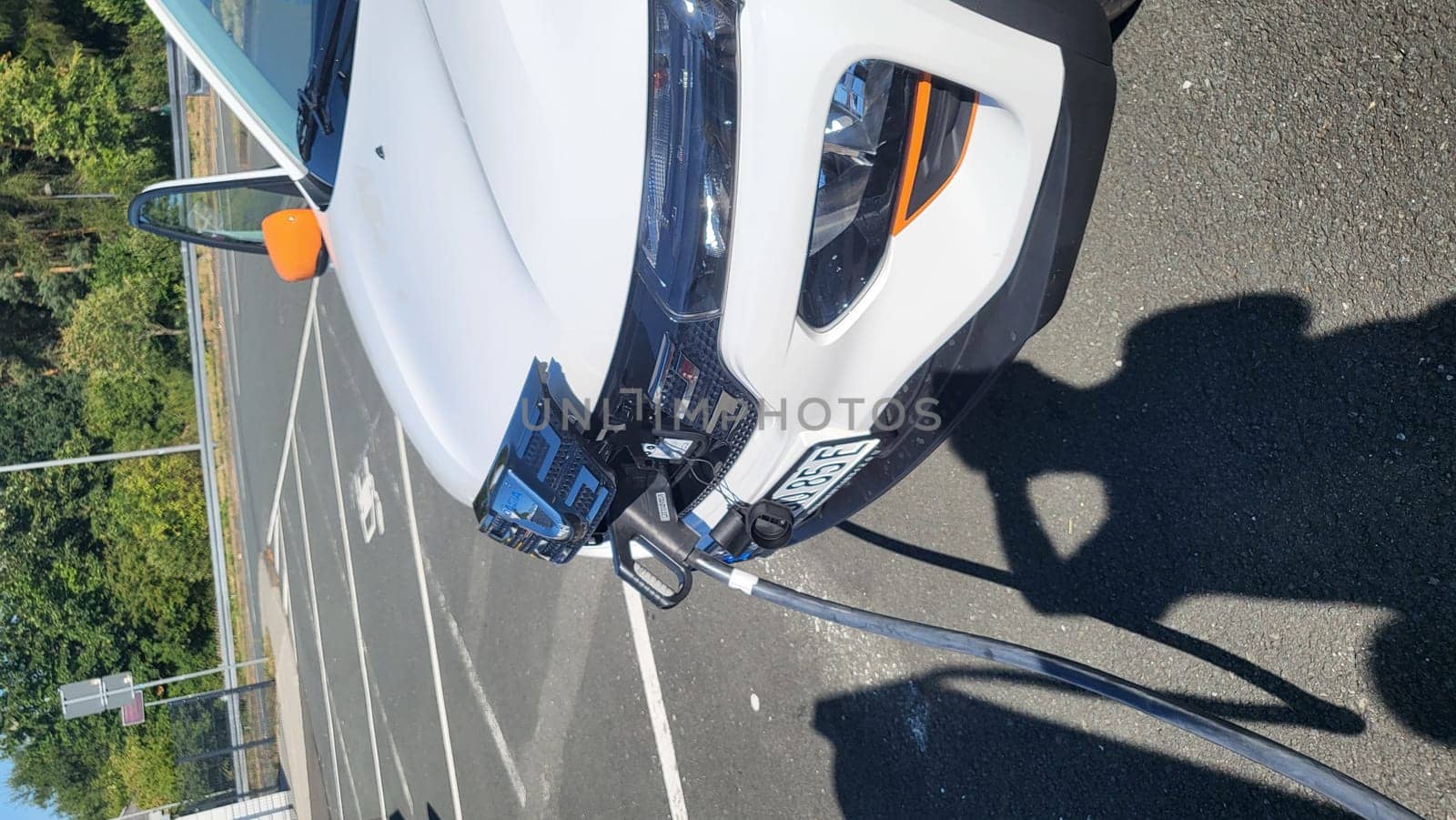 HEILIGENHAUS, NRW, GERMANY - AUGUST 10, 2022: Heiligenhaus, Nrw, Germany - August 10, 2022: Brand new electric Dacia Spring automobile being charged