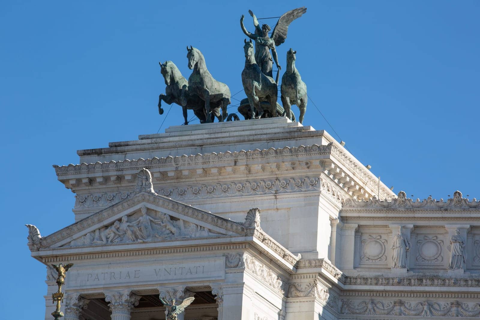 Rome, Italy - October 8, 2020: Victor Emmanuel II Monument (Monumento Nazionale a Vittorio Emanuele II) on Venetian Square and The Quadriga of Unity at the top of Propylaea