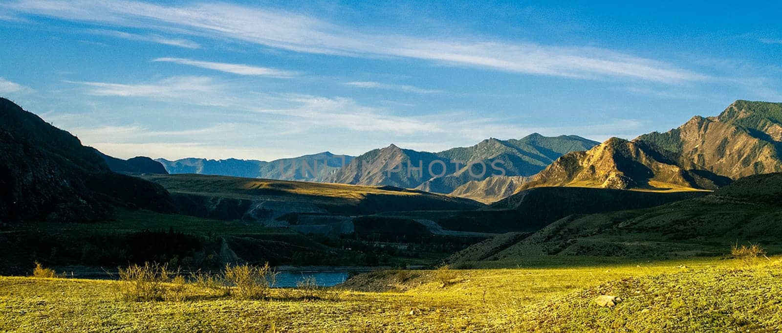 Mountains and hills altai in autumn, panoramic photo. Mountains and hills altai in autumn, panoramic photo.