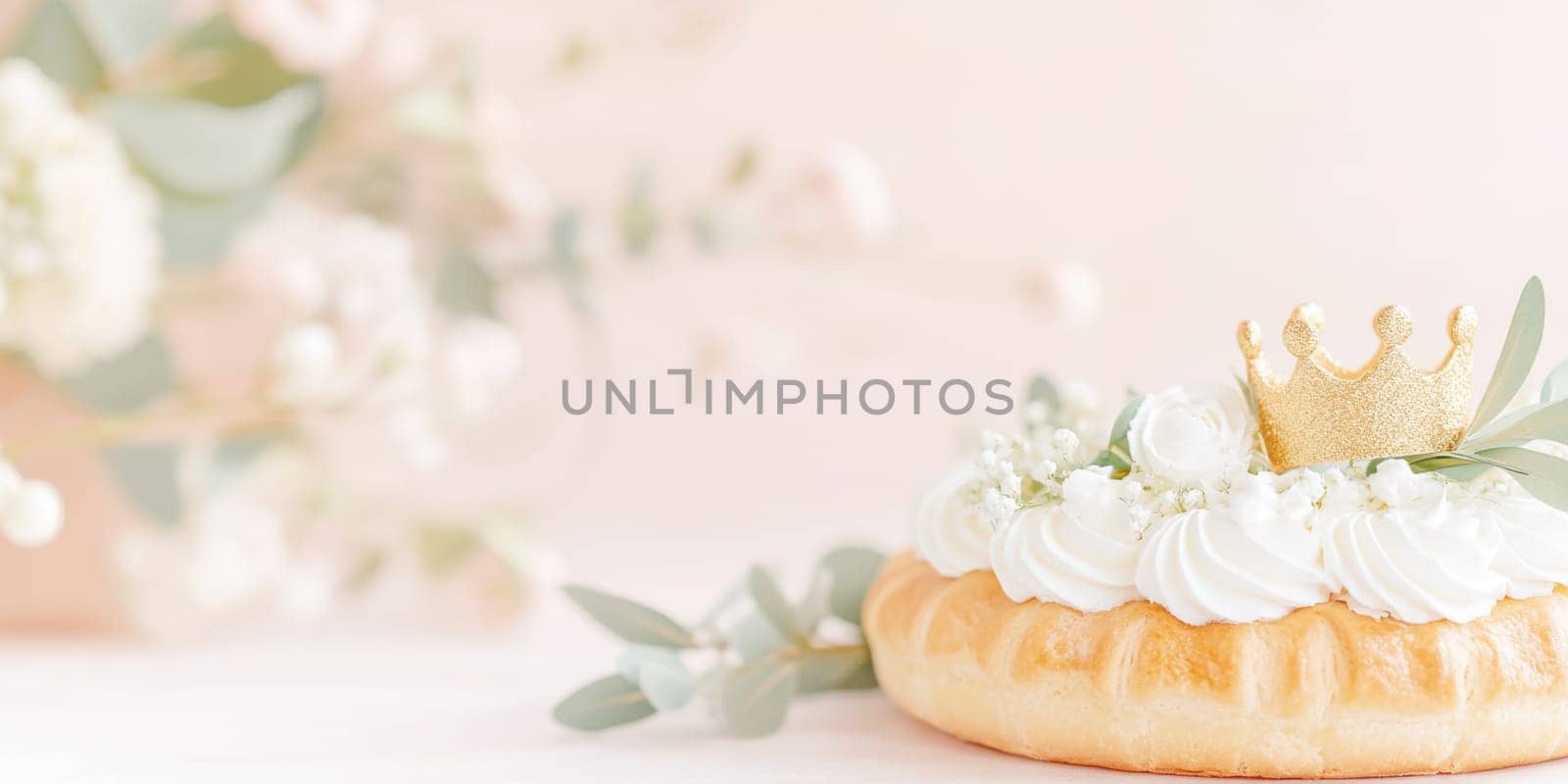 Festive scene with Three kings holiday festive cake topped with golden paper crown on table, pastel background, AI generated