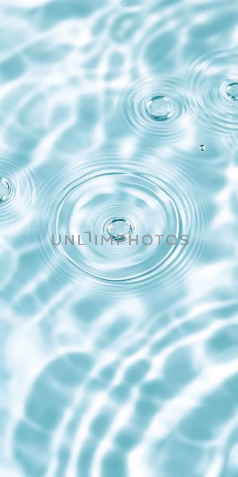 Ripples in clear blue water with abstract circular patterns, suitable as calming SPA background, AI generated