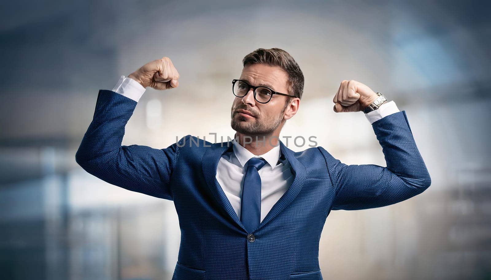 Confident businessman flexing arms muscles imagine super power. Fit business person in a confident and strong pose